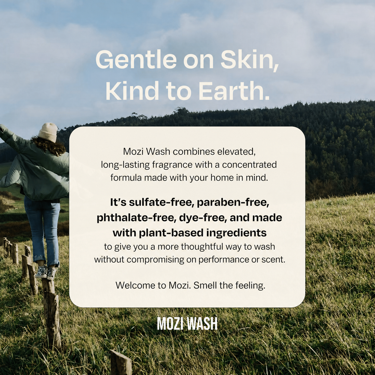 A promotional outdoor graphic for Mozi Wash with a woman standing on a fence in a grassy field under a cloudy sky. Large text reads 'Gentle on Skin, Kind to Earth.