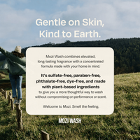 A promotional outdoor graphic for Mozi Wash with a woman standing on a fence in a grassy field under a cloudy sky. Large text reads 'Gentle on Skin, Kind to Earth.