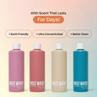 Four Mozi Wash laundry detergent bottles in pink, coral, beige, and blue, displayed against a soft pastel gradient background with marketing text above.