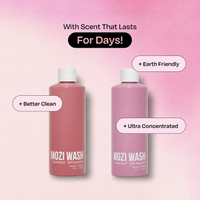 Two Mozi Wash laundry detergent bottles in dusty pink and mauve shades, displayed on a soft pink gradient background with promotional text overlays.